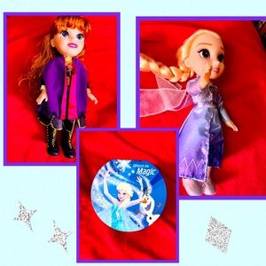 Frozen toys. Both dolls and music box.